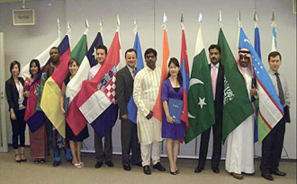 The participants with the flags of each of their countries.