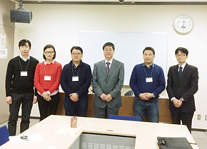 Saying “cheese” in front of a booth of the Osaka branch of Kaze-travel, featuring a yurt.