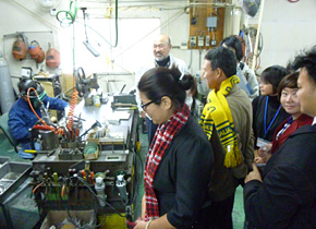 Seminar participants visit Daiwa Co., a manufacturer of door handles, corner frames, etc., in Yao City. Company President explained how his company is currently planning to venture into the glass door market in the ASEAN region.