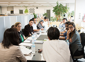 Participants learn about business management and how to utilize financial institutions, during a visit to Tora Co.