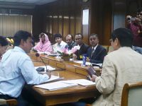 The scene of a seminar. In attendance are officials from the Bangladesh Bank, SME Foundation and other organizations.