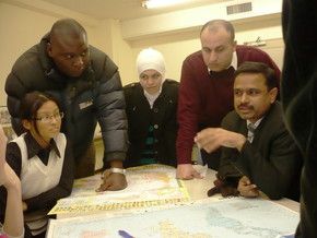 The participants use a map to introduce their countries on the seminarʼs first day. The participants showed a lot of interest, as their countries are so geographically far from each other.