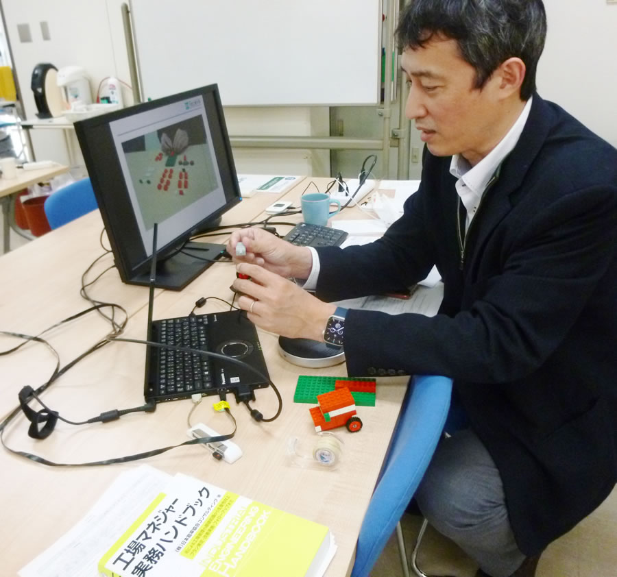 Prof. Minagawa using Lego blocks in his ‘Kaizen’ lecture.